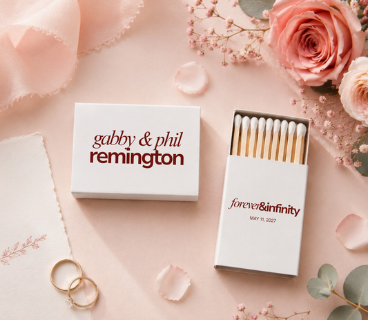 Personalized Forever Yours wedding matchboxes with custom names, wedding date, and red typography on white matchboxes