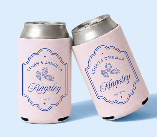 Personalized oyster wedding can coolers with blue oyster shell design on blush pink drink sleeves for coastal wedding favors