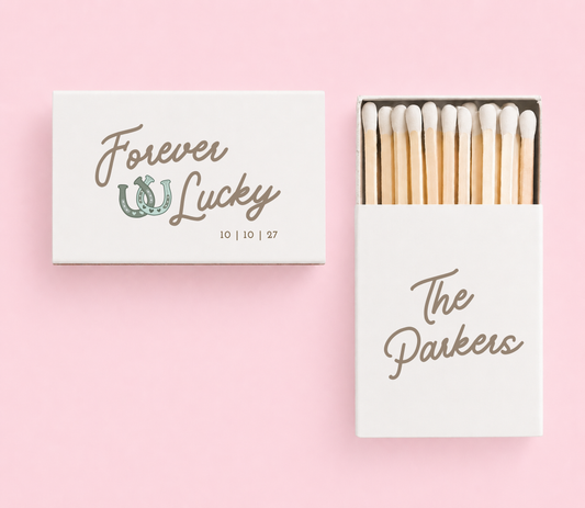 Personalized lucky horseshoe wedding matchbox with western-inspired artwork and custom wedding details.
Rustic wedding favor featuring a horseshoe illustration and personalized couple names.