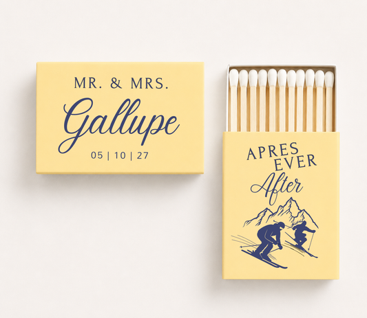 Personalized "Après Ever After" wedding matchboxes featuring custom family name, wedding date, and ski-inspired mountain illustration for winter weddings.