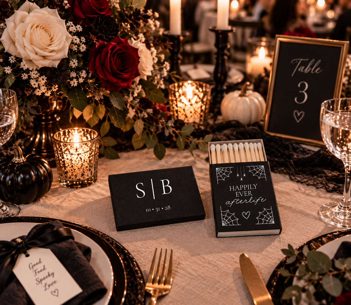 Personalized Halloween wedding matchboxes featuring black and white spiderweb artwork, couple initials, and custom wedding date.