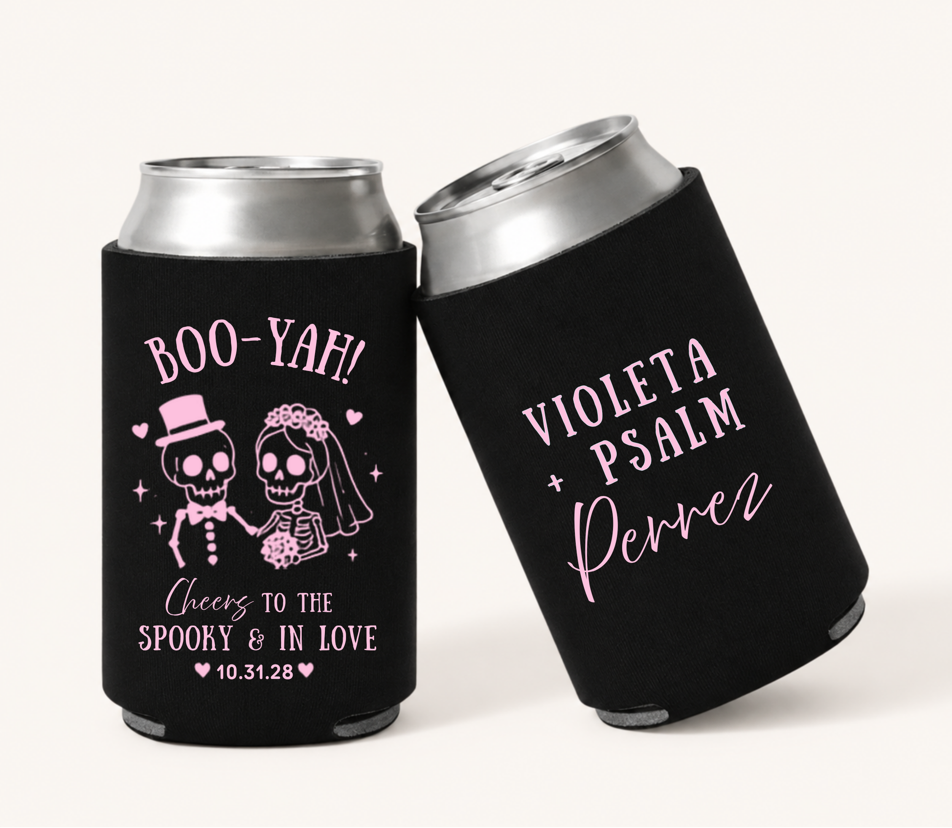 Personalized Boo-Yah Spooky in Love black Halloween wedding can coolers featuring pink skeleton bride and groom artwork, custom couple names, surname, wedding date, and Cheers to the Spooky & in Love design.
