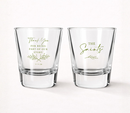 Personalized Thank You wedding shot glasses featuring a custom family name, wedding date, botanical olive branch artwork, and Thank You For Being Part Of Our Story message.