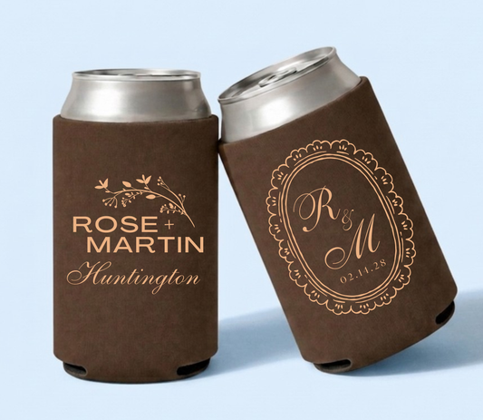 Brown personalized foam wedding can coolers featuring botanical artwork, custom names Rose and Martin Huntington, vintage monogram R&M, and wedding date February 14, 2028.