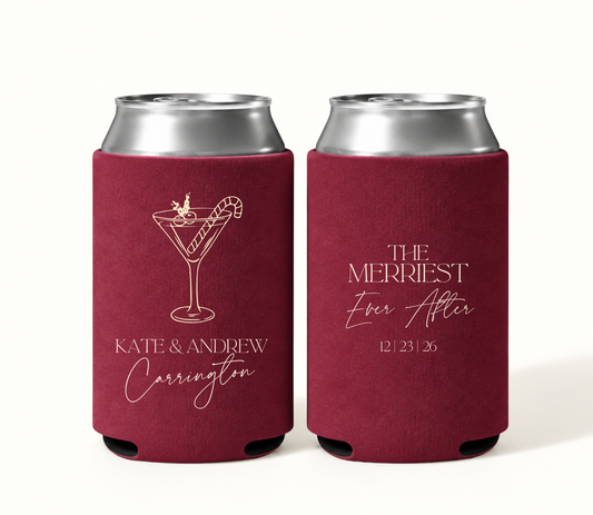Personalized burgundy Christmas wedding can coolers featuring cream candy cane cocktail artwork, Kate and Andrew Carrington names, Merriest Ever After wording, and wedding date 12.23.26.