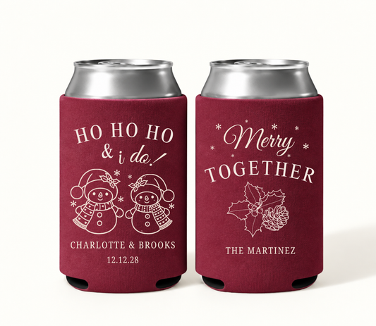 Personalized burgundy Ho Ho Ho & I Do Christmas wedding can coolers featuring cream snowmen, Merry Together holly and pinecone artwork, Charlotte and Brooks names, wedding date, and Martinez family name.