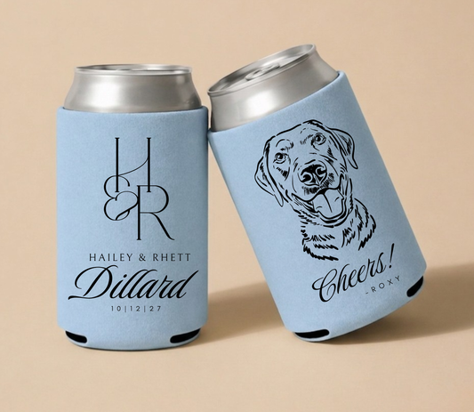 Dusty blue personalized wedding can coolers featuring an elegant monogram, custom dog portrait, couple names, and wedding date.