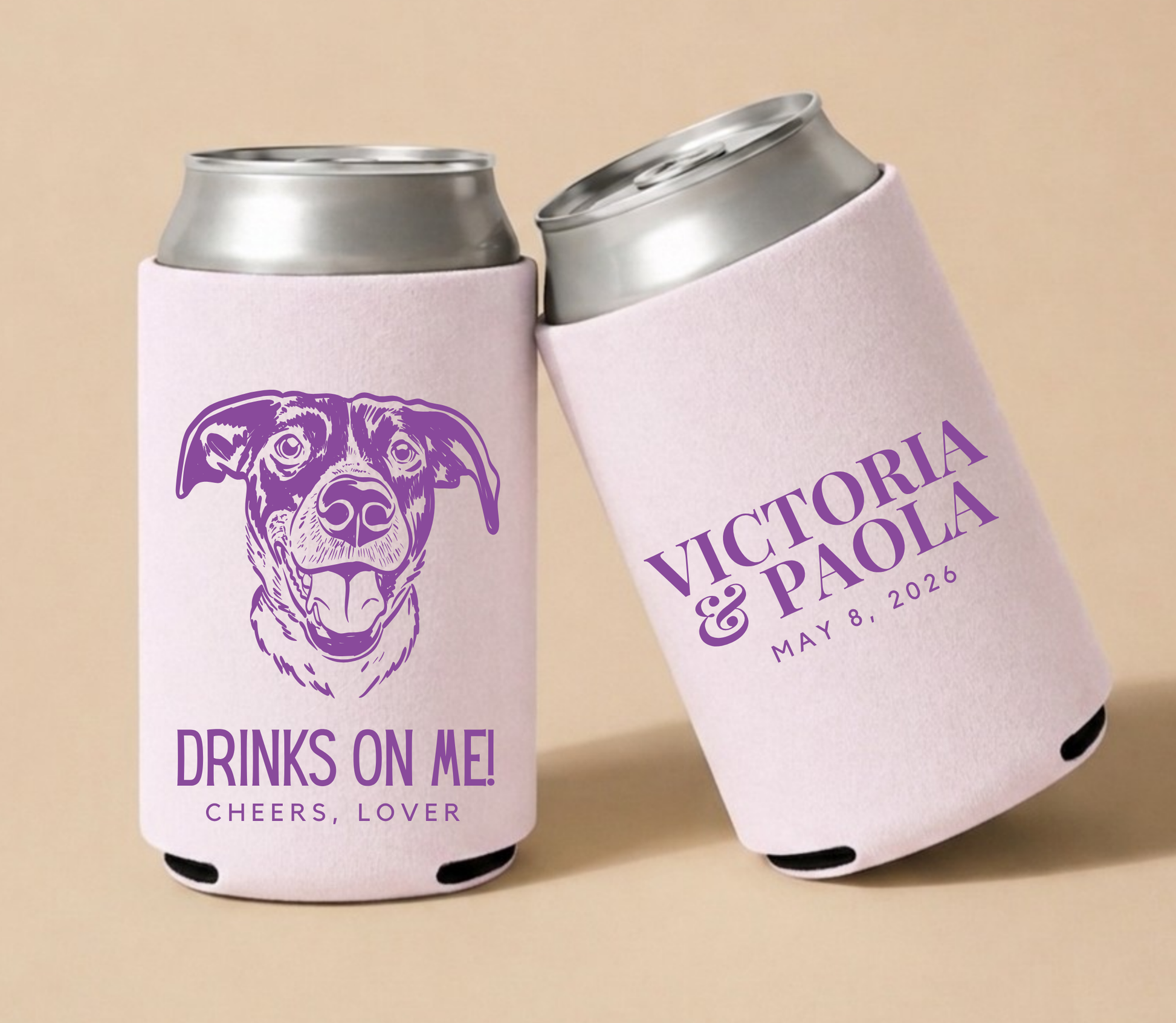 Blush personalized wedding can coolers featuring a custom dog portrait, Drinks On Me design, couple names, and wedding date.