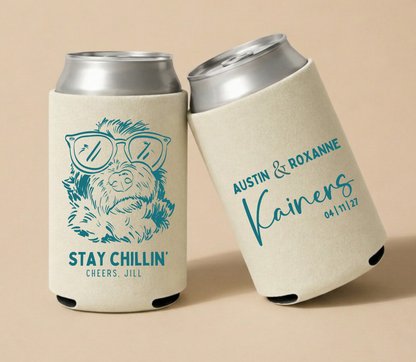 Cream personalized wedding can coolers featuring a custom dog portrait wearing sunglasses, couple names, and wedding date.