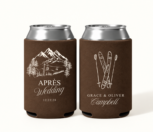 Personalized chocolate brown Après Ski wedding can coolers featuring ivory mountain ski resort artwork, crossed skis, Grace and Oliver Campbell names, and wedding date.