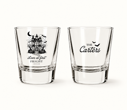 Personalized clear Love at First Fright Halloween wedding shot glasses featuring a black haunted house, bats, Carter surname, and wedding date 10.31.28.