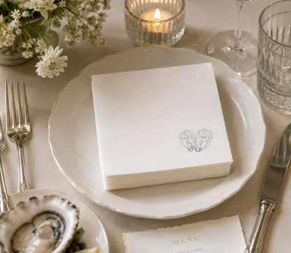 Personalized coastal wedding napkins with oyster shell design for oyster bars, cocktail hour, and seafood receptions