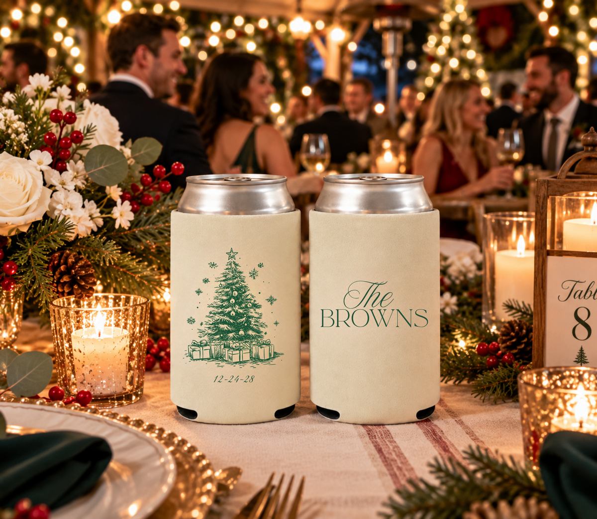 Personalized winter wedding can coolers featuring green holiday artwork, wedding date, and family name.