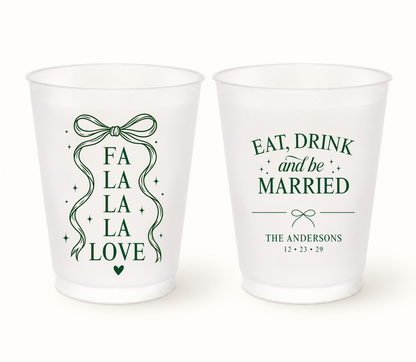 Personalized Christmas bow wedding frosted cups featuring holiday ribbon design with custom couple names and wedding date.