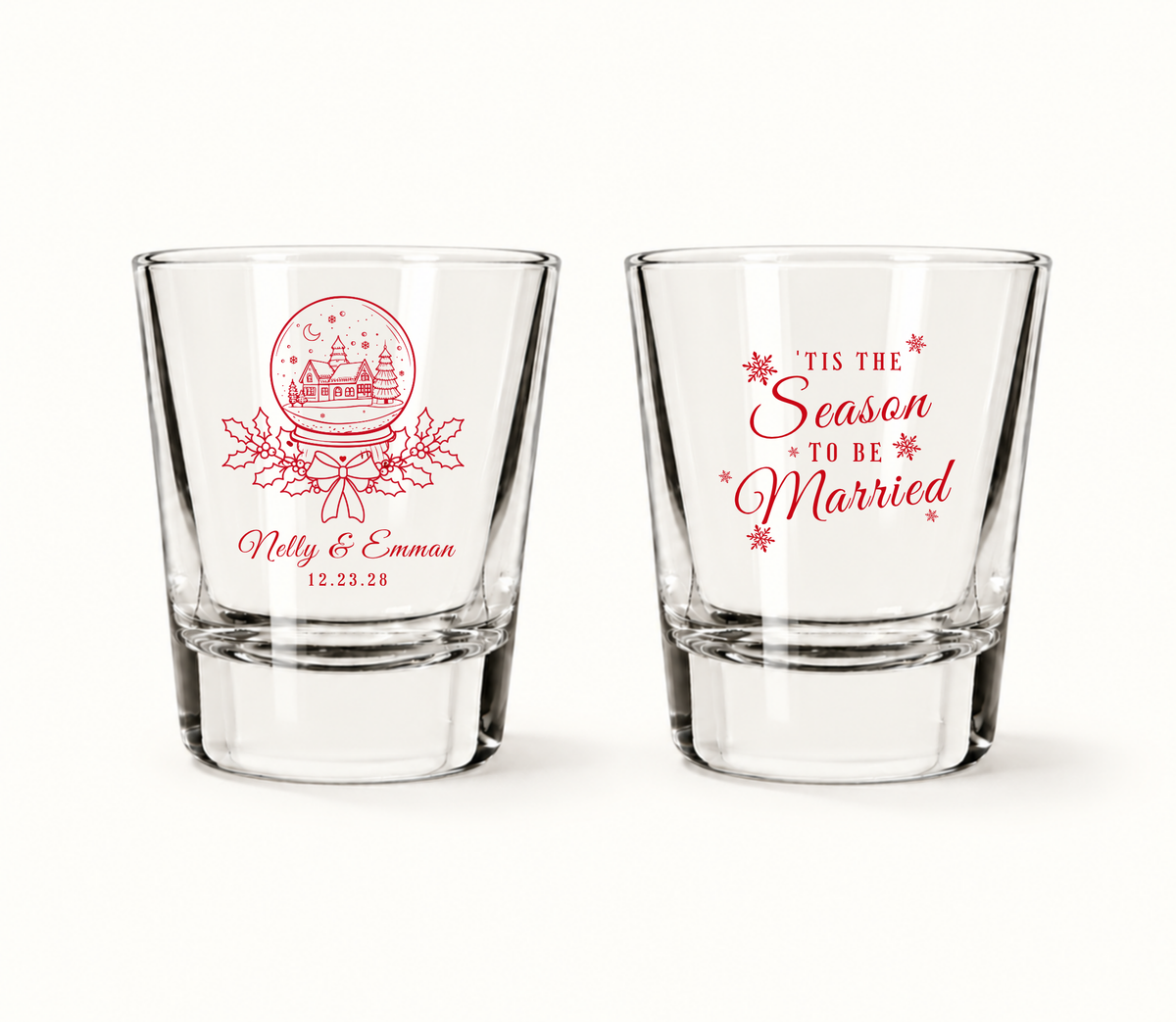 Personalized Tis The Season To Be Married Christmas wedding shot glasses featuring snow globe artwork, custom couple names, and wedding date.