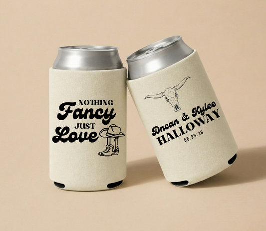 Personalized western wedding can coolers with black longhorn skull artwork, cowboy boot design, custom names, and wedding date on cream drink sleeves