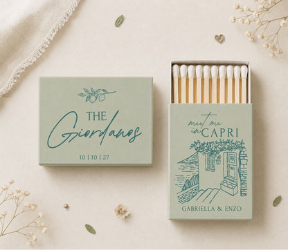 Custom Italian destination wedding matchboxes featuring coastal artwork, personalized couple names, and premium safety matches.