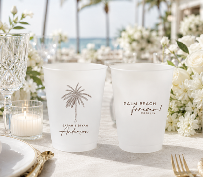 Custom Palm Beach wedding frosted cups with palm tree artwork, personalized names, luxury coastal design, and destination wedding details