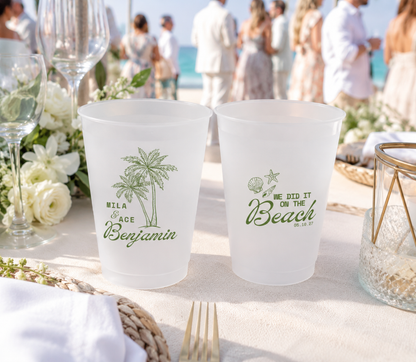 Custom beach wedding frosted cups with palm tree artwork, personalized names, tropical design, and destination wedding details
