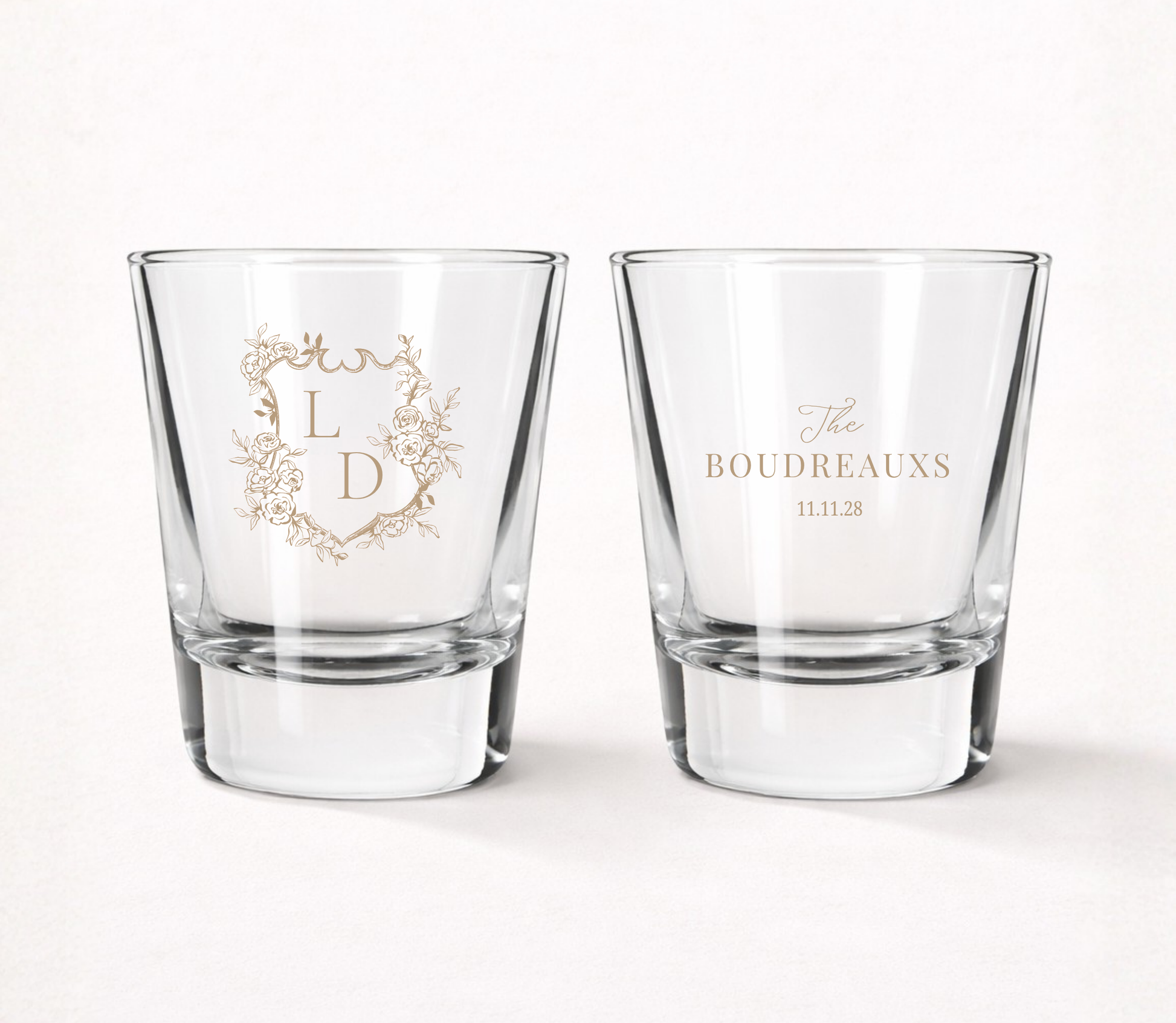 Personalized Boudreaux Floral wedding shot glasses featuring custom initials, family name, wedding date, and elegant floral monogram crest.