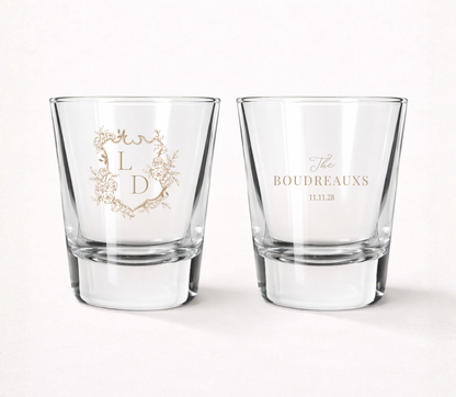 Personalized Boudreaux Floral wedding shot glasses featuring custom initials, family name, wedding date, and elegant floral monogram crest.