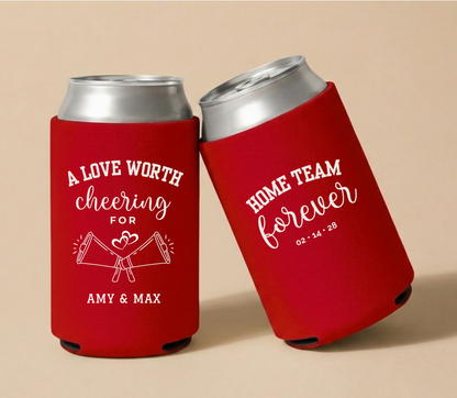 Personalized A Love Worth Cheering For wedding can coolers featuring megaphone artwork, custom couple names, and wedding date.