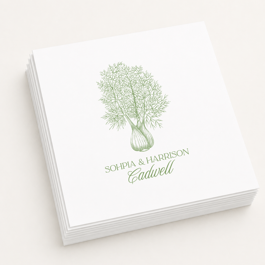 White personalized botanical wedding cocktail napkins featuring a detailed greenery illustration, custom couple names Sophia and Harrison, and family surname Cadwell.