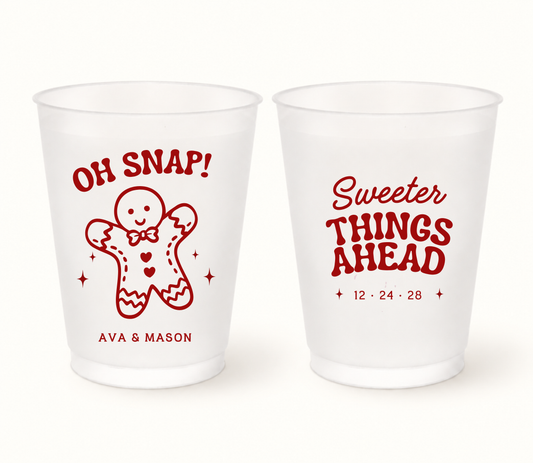 Personalized Oh Snap Gingerbread Christmas wedding frosted cups featuring gingerbread and holiday typography designs with custom couple names and wedding date.
