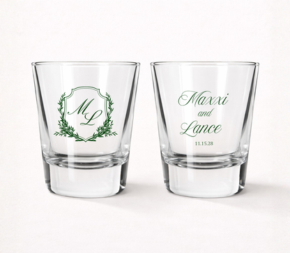 Personalized Maxxi Laurel Monogram wedding shot glasses featuring custom initials, couple names, wedding date, and elegant laurel frame.
