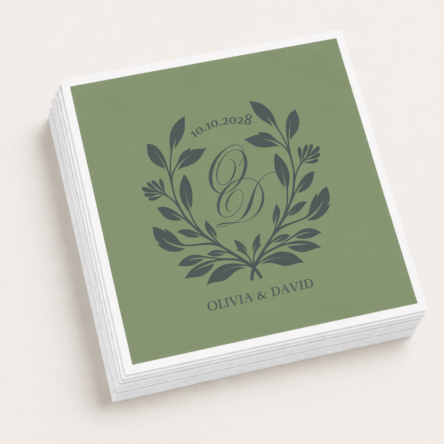 Sage green personalized wedding cocktail napkins featuring a botanical monogram with custom initials, couple names Olivia and David, and wedding date.