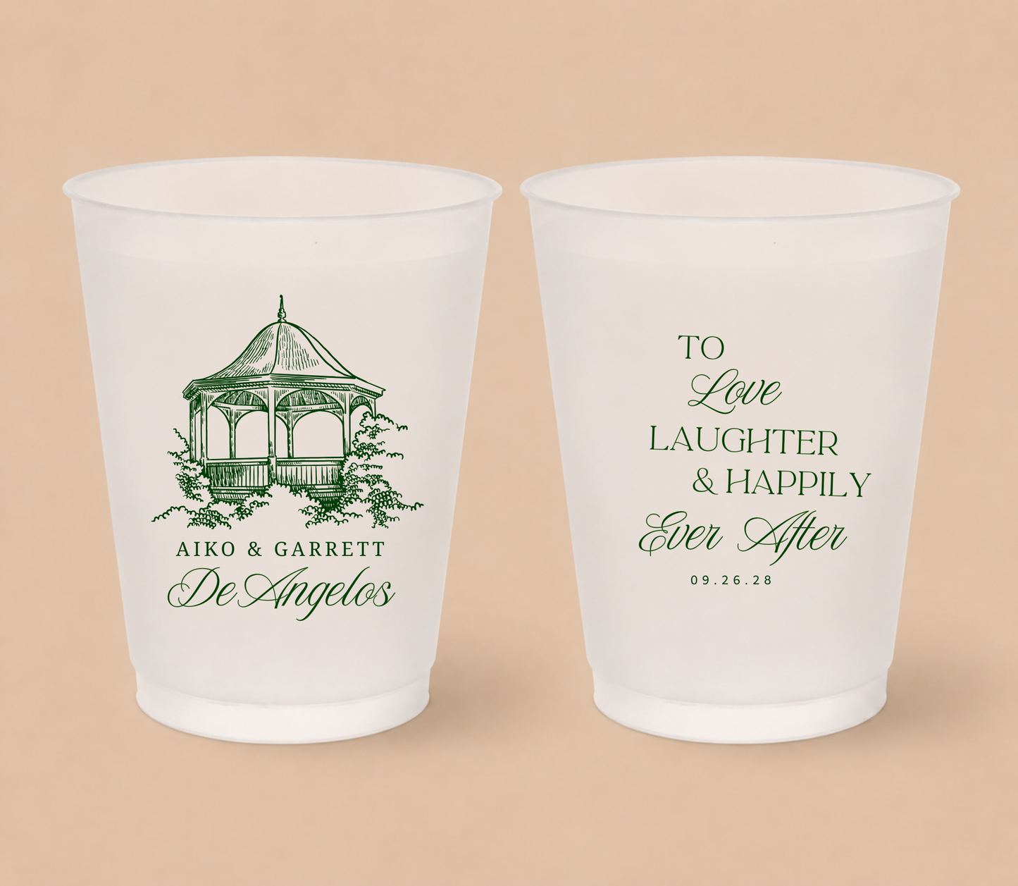 White frosted wedding cups featuring a custom gazebo venue illustration, couple names, family surname, romantic wedding quote, and wedding date.