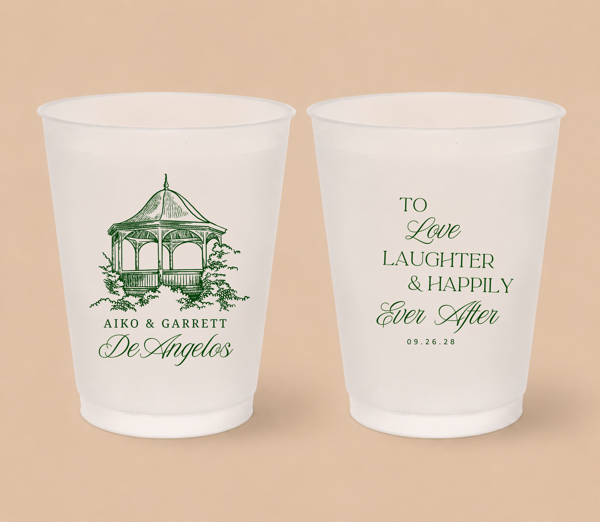 White frosted wedding cups featuring a custom gazebo venue illustration, couple names, family surname, romantic wedding quote, and wedding date.