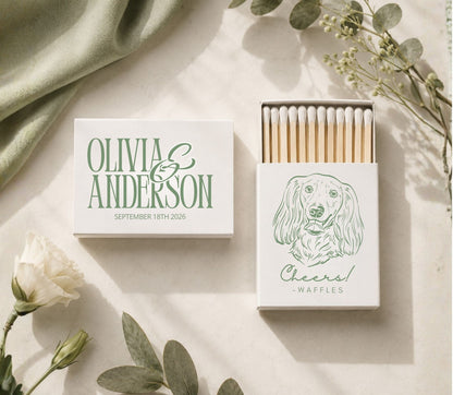 Custom pet portrait wedding matchboxes featuring a dog illustration, couple names, wedding date, and safety matches.