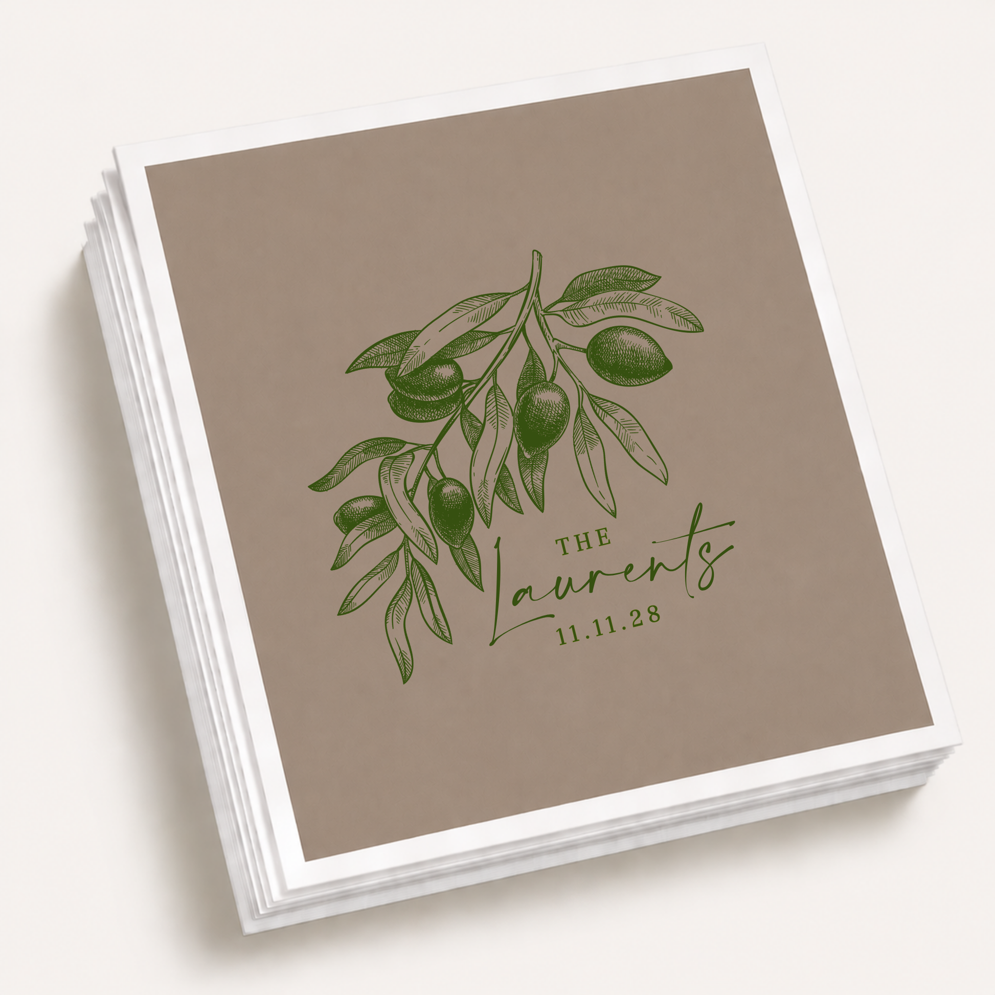 Taupe personalized olive wedding cocktail napkins featuring an elegant olive branch illustration, custom family surname Laurents, and wedding date.