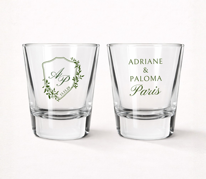 Personalized Paris Crest wedding shot glasses featuring custom initials, couple names, wedding date, and an elegant botanical crest design.
