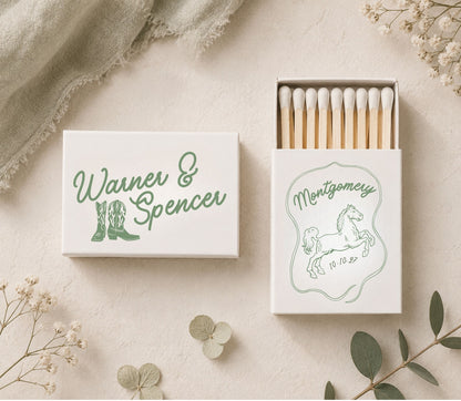 Custom western boots wedding matchboxes featuring elegant typography, personalized couple names, and rustic western design.