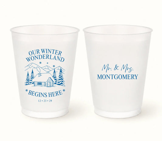 Personalized Winter Wonderland wedding frosted cups featuring snowy cabin design with custom couple names and wedding date.

