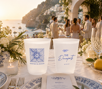 Personalized Mediterranean wedding frosted cups featuring blue tile artwork, custom names, family name, and wedding date