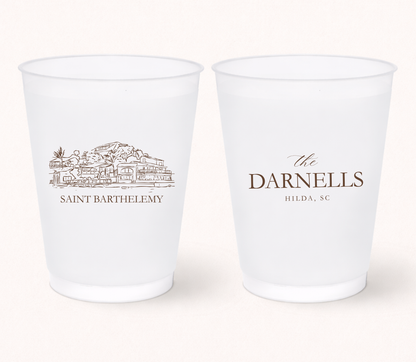 Personalized destination wedding frosted cups featuring a custom resort illustration, family name, and wedding location for elegant destination wedding celebrations.