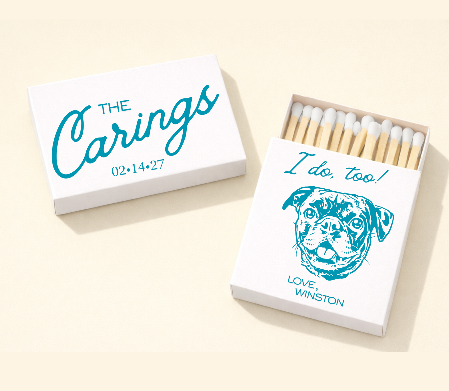Personalized pet portrait wedding matchboxes with teal blue custom dog artwork, couple names, wedding date, and pet name on white matchboxes