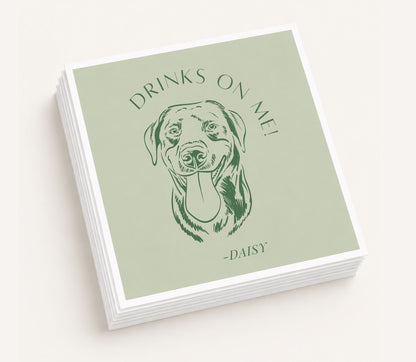 Sage green personalized wedding table napkin featuring a custom illustrated dog portrait, "Drinks on Me!" wording, personalized pet name Daisy, and premium paper construction.
Personalized wedding table napkin featuring a custom dog portrait with Drinks on Me design.
Custom dog portrait wedding table napkin with personalized pet name and sage green background.