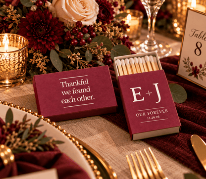 Personalized fall wedding matchboxes in burgundy featuring a “Thankful We Found Each Other” message.