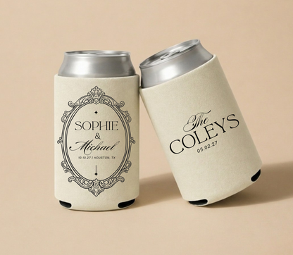 Personalized signature wedding can coolers with black ornate frame design on beige drink sleeves for elegant wedding favors