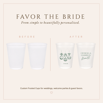 Christmas wedding favor cups with hanging ornaments, couple names, and wedding date.