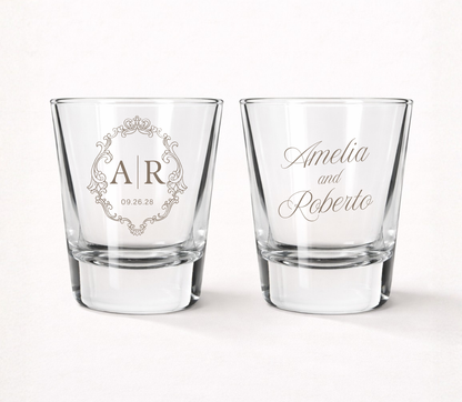 Personalized Elegant Monogram wedding shot glasses featuring custom initials, couple names, wedding date, and an ornate vintage frame design.