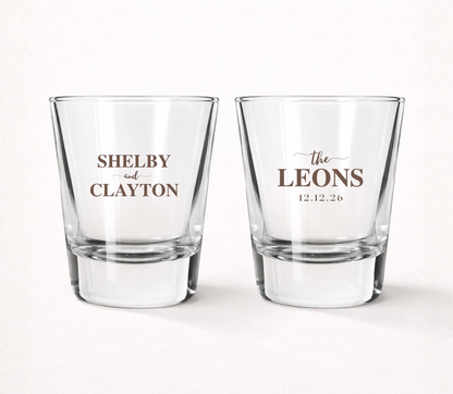 Personalized Leons wedding shot glasses featuring custom couple names, family name, and wedding date in a timeless classic design.