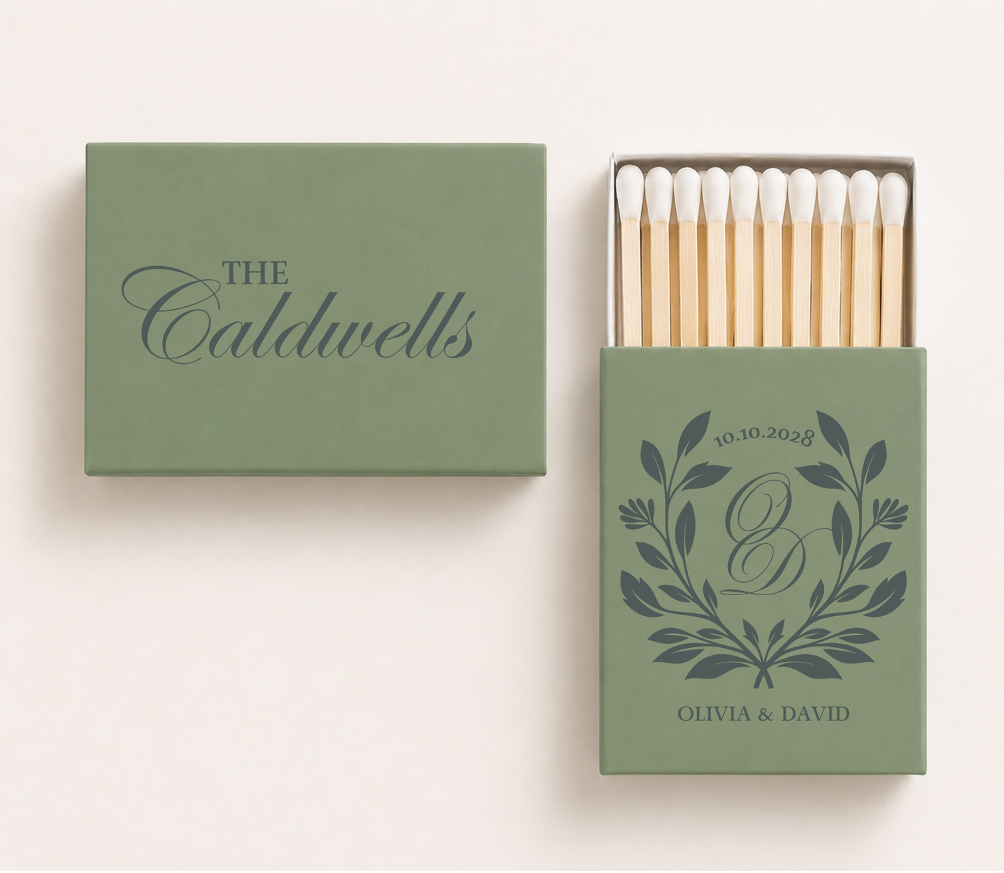 Sage green personalized wedding matchboxes featuring the Caldwells family surname, botanical monogram with initials O and D, custom couple names Olivia and David, and wedding date.

Personalized sage green wedding matchbox featuring botanical monogram and custom surname.

Custom botanical wedding matchbox with couple names, monogram, and wedding date.