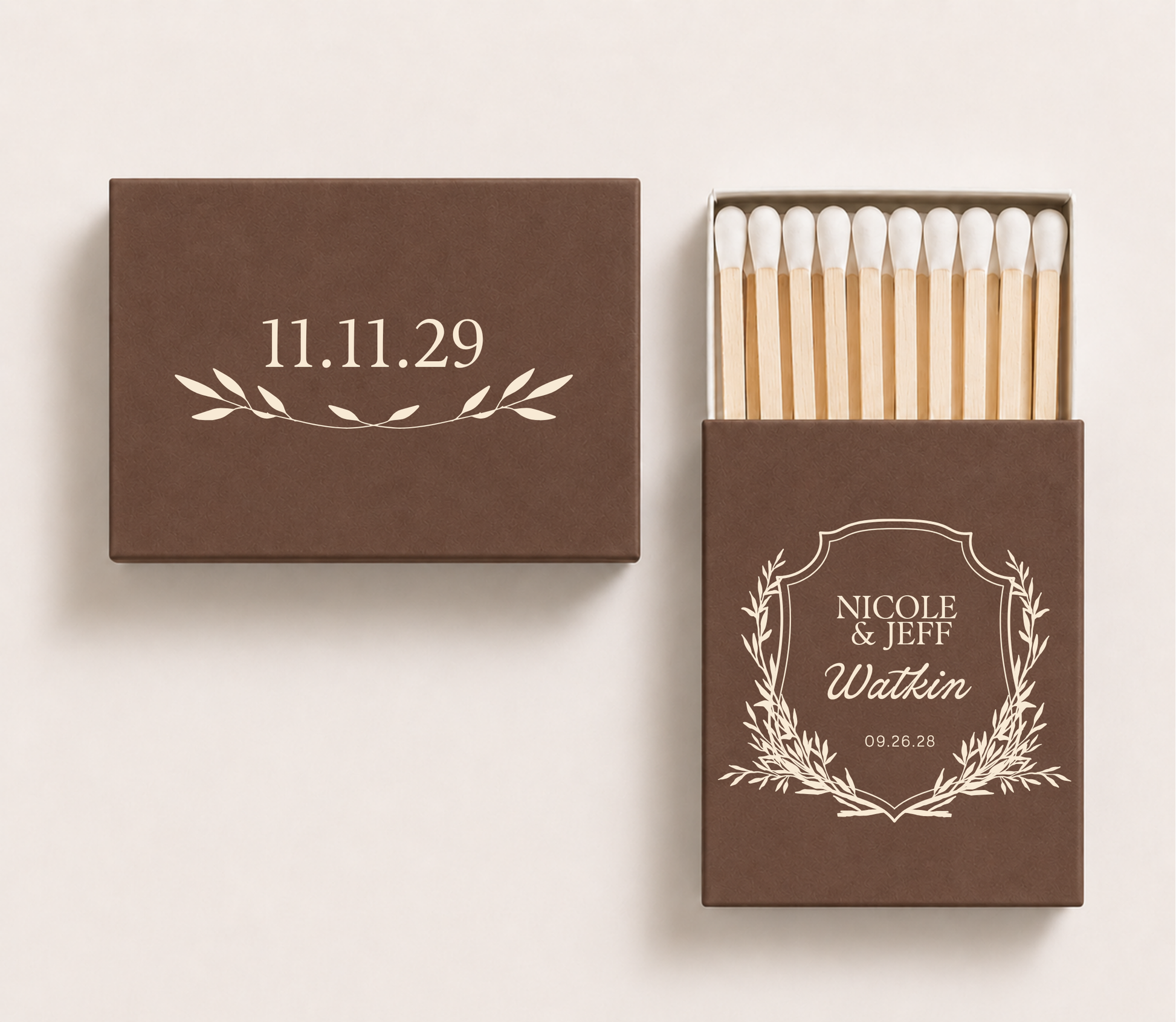 Brown personalized wedding crest matchboxes featuring custom couple names Nicole and Jeff, Watkin family surname, botanical crest, and wedding date.

Brown personalized wedding matchbox featuring an elegant botanical crest and custom names.

Custom monogram wedding matchbox with botanical frame, surname, and wedding date.