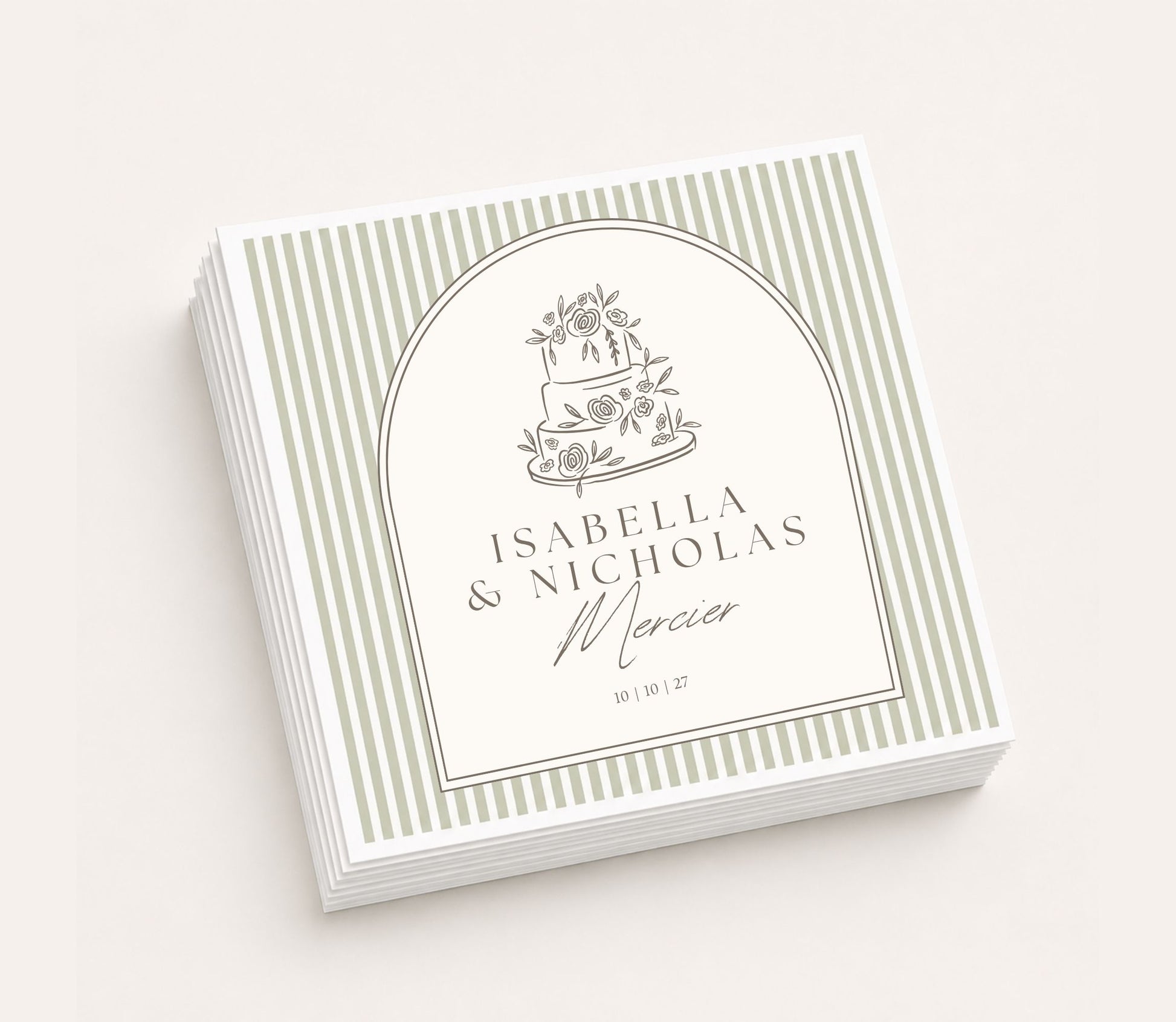 White personalized wedding table napkin featuring a hand-drawn floral wedding cake illustration, custom names Isabella and Nicholas Mercier, wedding date 10.10.27, framed with sage green pinstripes.
Personalized wedding table napkin featuring a vintage floral wedding cake illustration and custom couple names.
Elegant wedding reception napkin with hand-drawn cake artwork, personalized names, and wedding date.