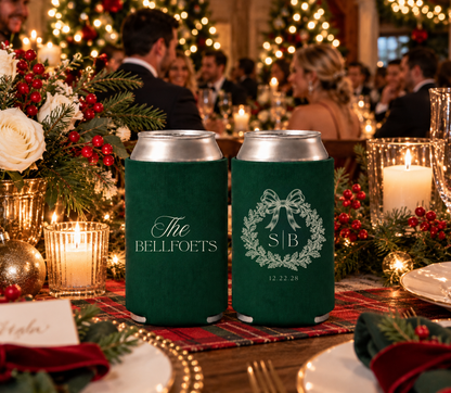 Elegant green neoprene wedding can coolers featuring botanical wreath and bow artwork.